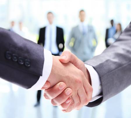48324521-closeup-of-a-business-handshake-business-people-shaking-hands-finishing-up-a-meeting.jpg